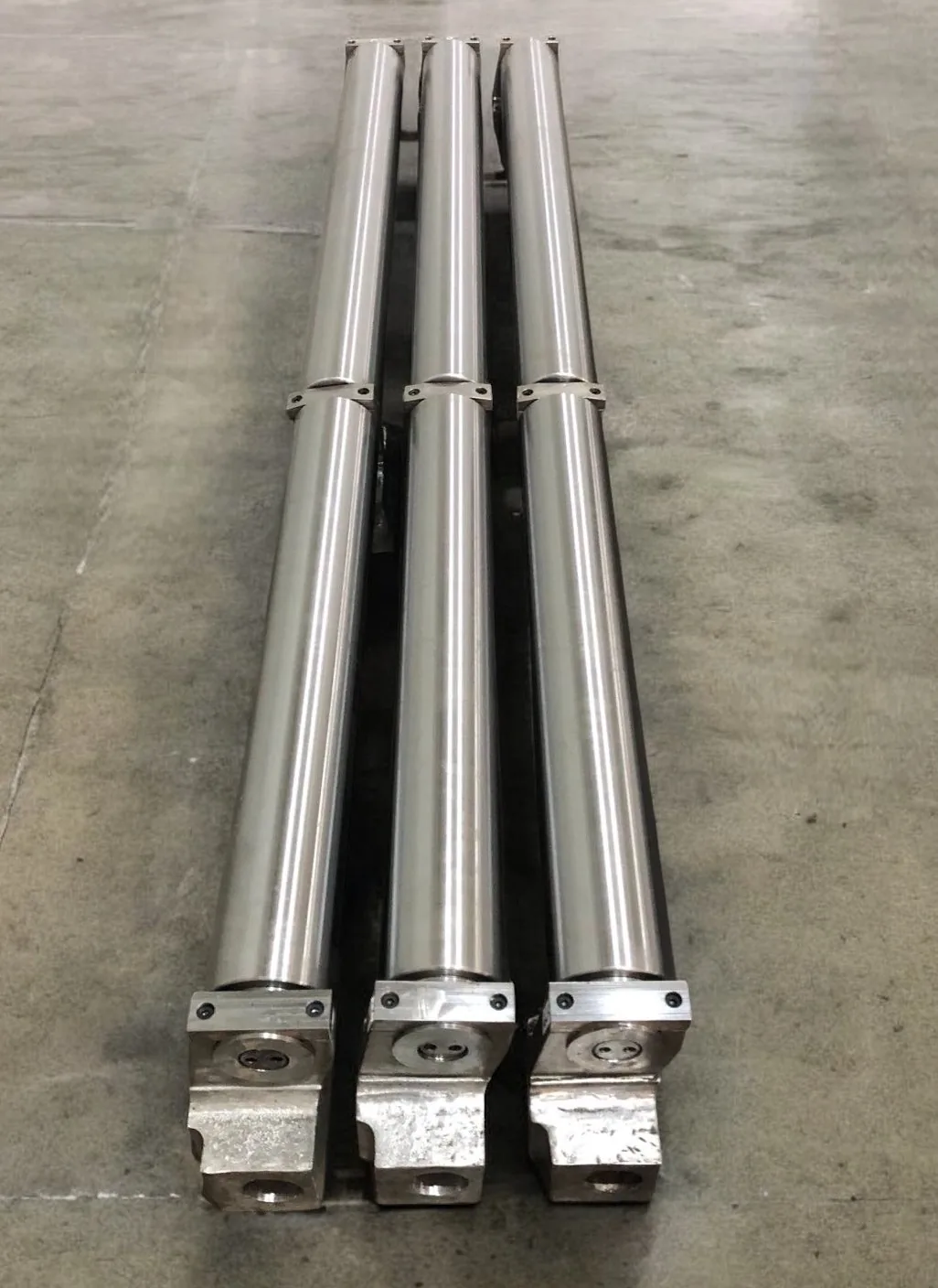Finished cylindrical components prepared for inspection